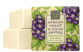 Shea butter soap bar with African violet and cocoa butter packaging on a white background